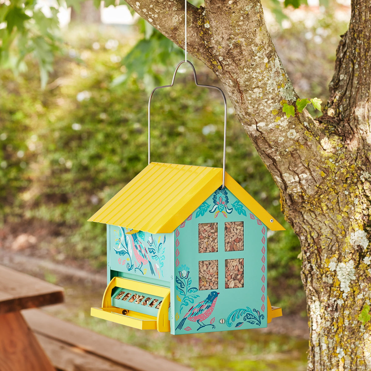 Bird feeder in teal and yellow view 2