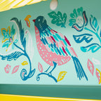 Bird feeder in teal and yellow view 8