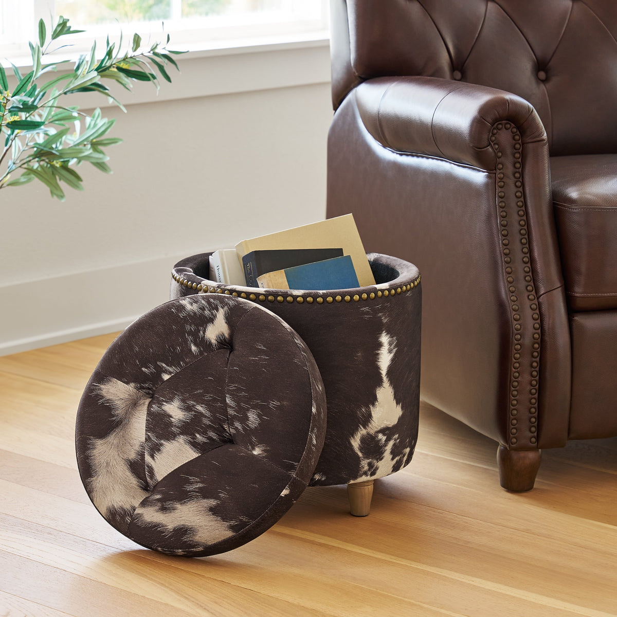 Storage ottoman in Cowhide