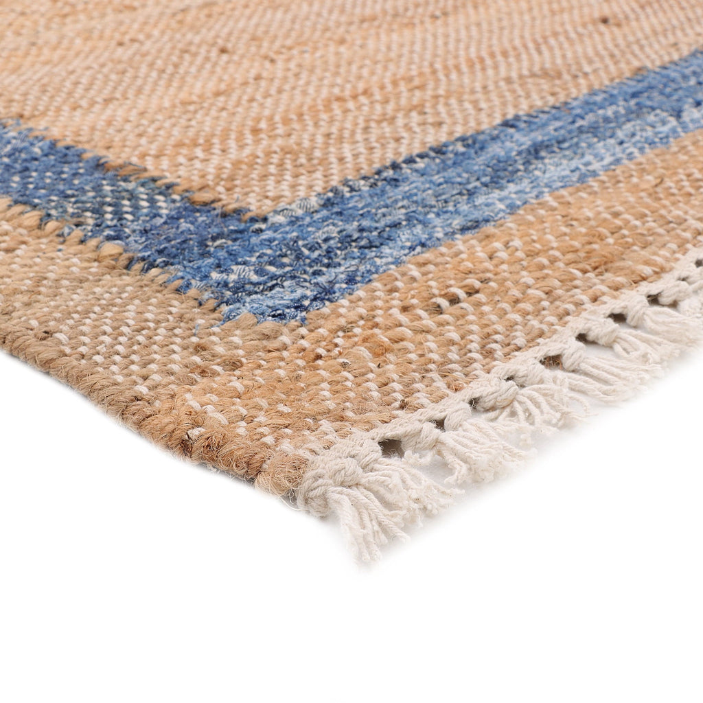 Runner rug in natural with a blue border view 5